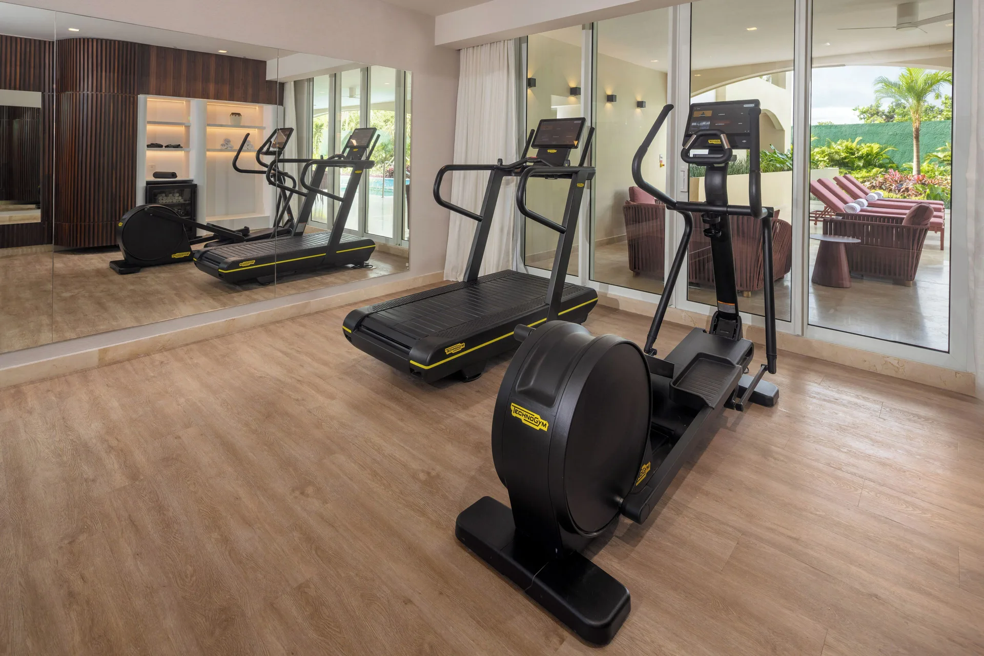 Grand Villa Pool Three Bedroom fitness room at Moon Palace The Grand Cancun with cardio machines.