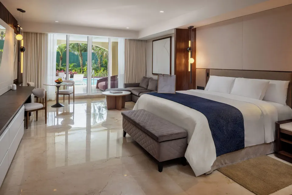 Grand Villa Pool Three Bedroom king bedroom at Moon Palace The Grand Cancun with terrace pool access.