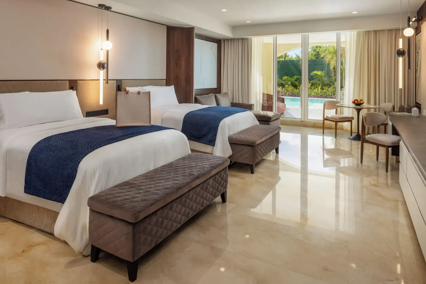 Grand Villa Pool Three Bedroom double-bed room at Moon Palace The Grand Cancun with terrace pool view.