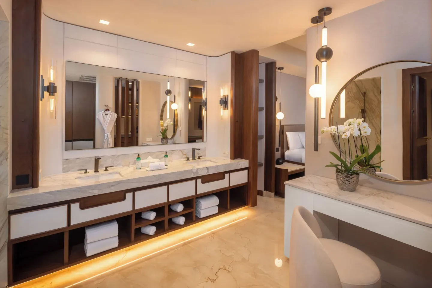 Grand Villa Sunset View Three Bedroom bathroom at Moon Palace The Grand Cancun with double vanity and dressing table.