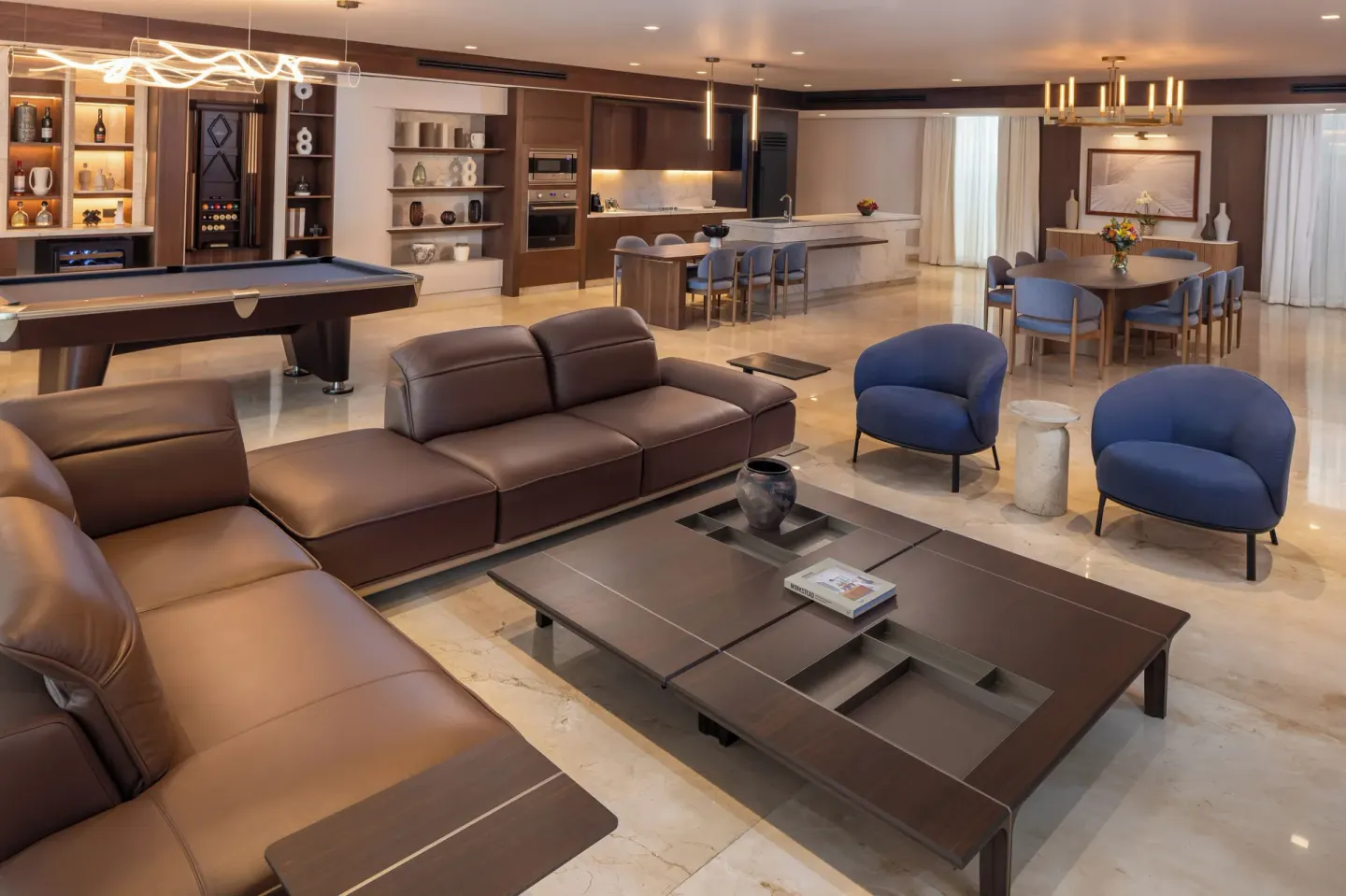 Grand Villa Sunset View Three Bedroom living room at Moon Palace The Grand Cancun with sofas and pool table.