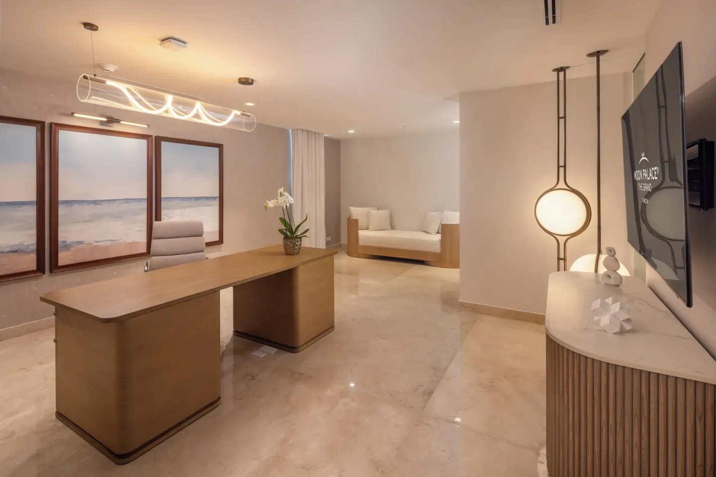 Grand Villa Sunset View Three Bedroom office at Moon Palace The Grand Cancun with desk and wall-mounted TV.