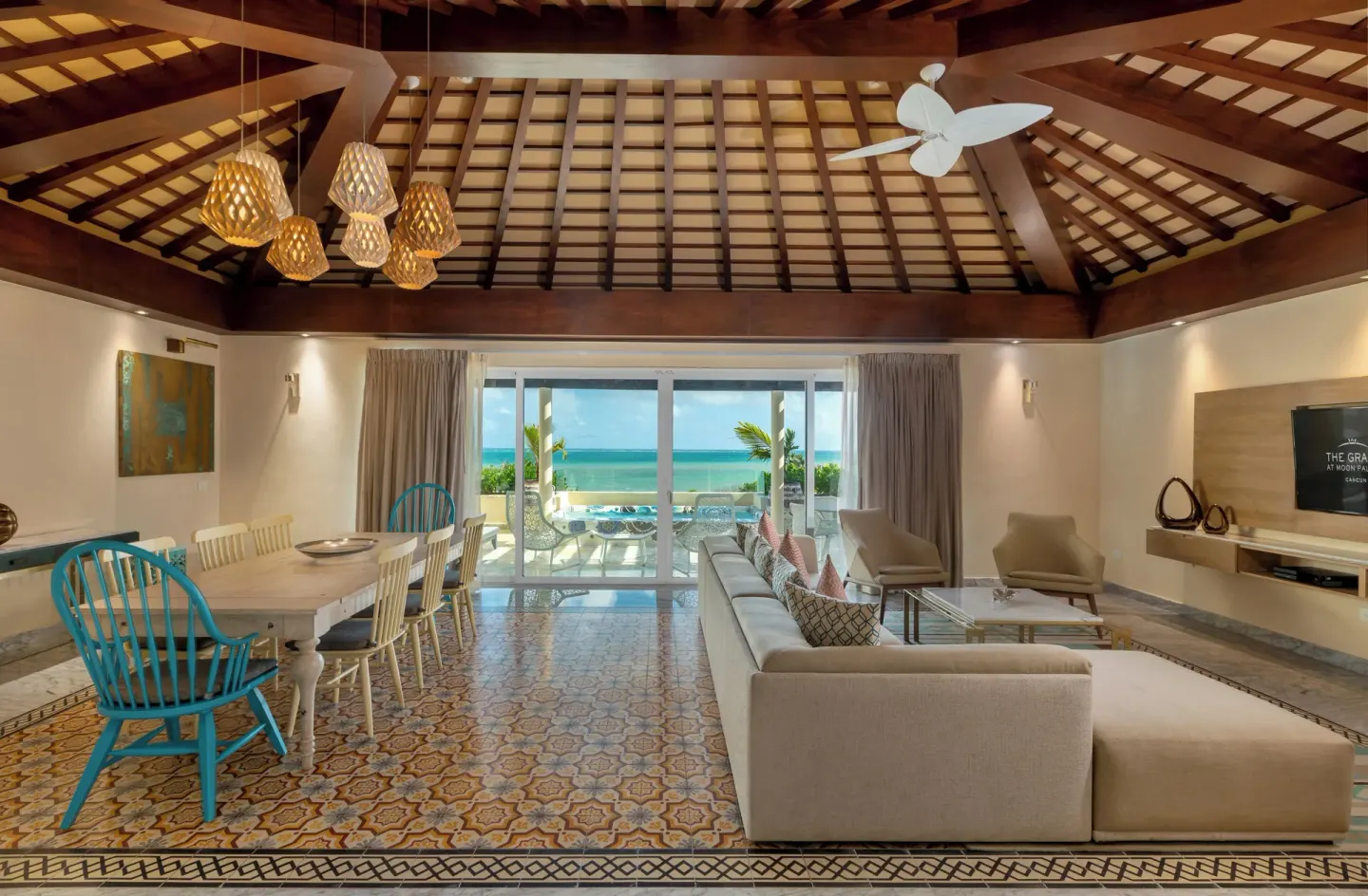 Grand Villa Three Bedroom living and dining room with ocean view at Moon Palace The Grand Cancun.