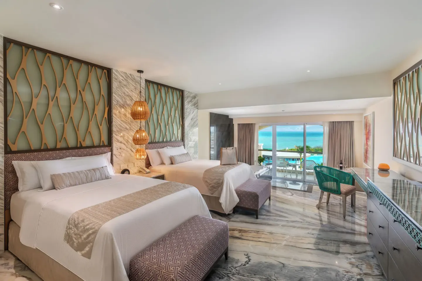 Grand Villa Three Bedroom double-bed room with ocean-facing balcony at Moon Palace The Grand Cancun.