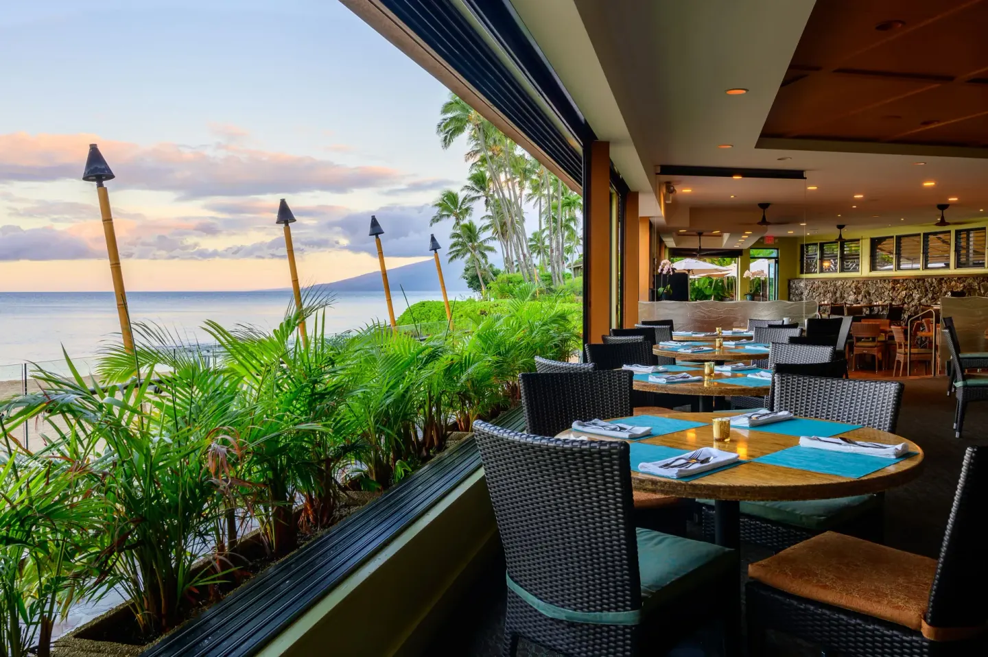 Open-air ocean-view dining room at Napili Kai Beach Resort.