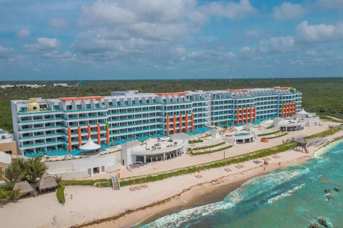 Aerial beachfront view of the resort building at Nickelodeon Hotels & Resorts Riviera Maya.