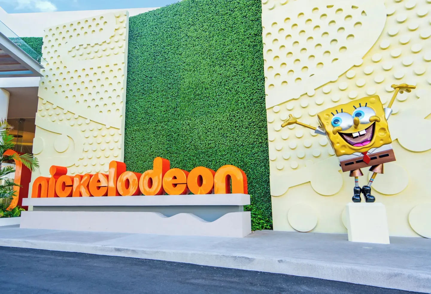 Nickelodeon entrance sign and SpongeBob figure at Nickelodeon Hotels & Resorts Riviera Maya.