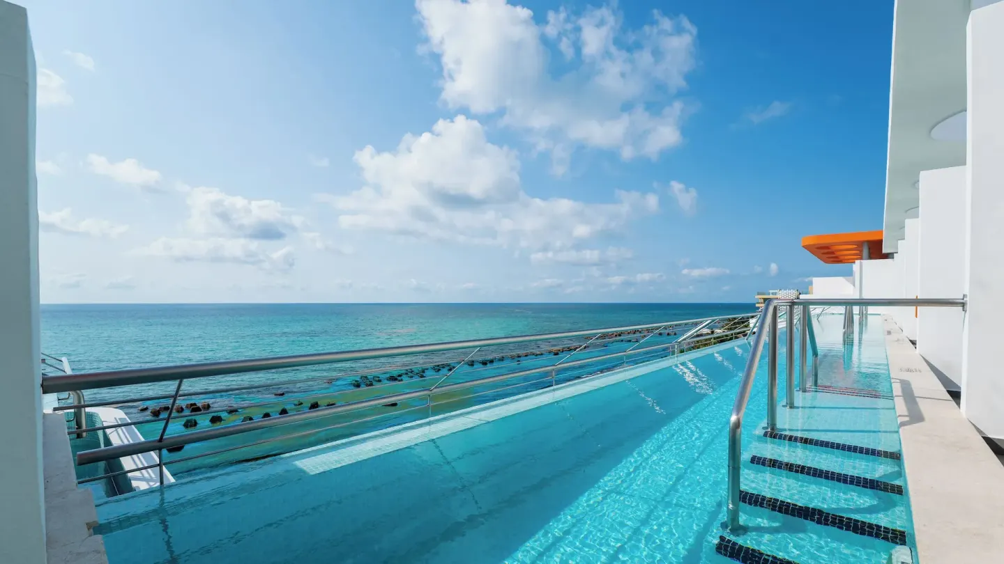 Oceanfront swim-up penthouse pool terrace at Nickelodeon Hotels & Resorts Riviera Maya.