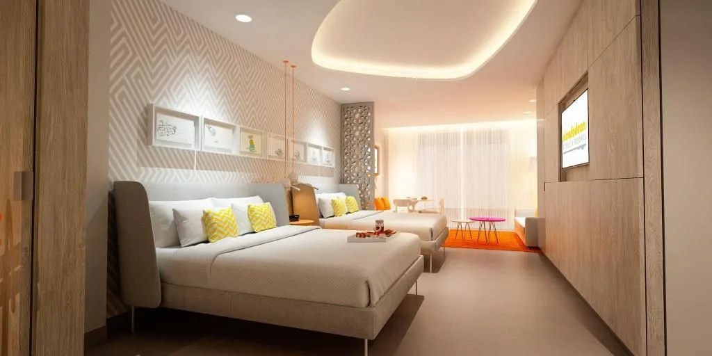 Penthouse Oceanfront Swim-Up Suite two-bed sleeping area at Nickelodeon Hotels & Resorts Riviera Maya.
