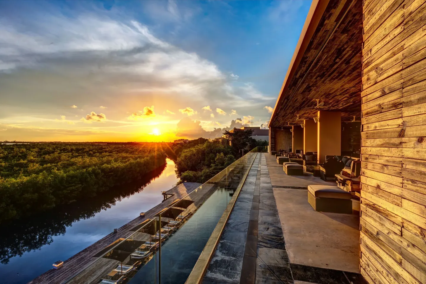 Sunset terrace with reflecting pool and lagoon view at Nizuc Resort and Spa.
