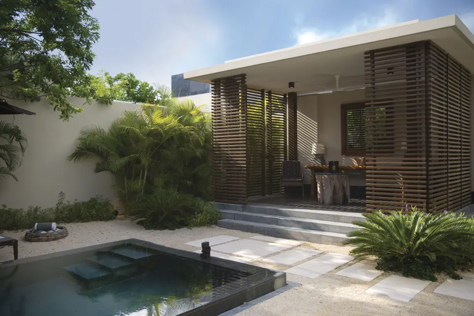 Private Pool Pavilion Villa courtyard with plunge pool and shaded terrace at Nizuc Resort and Spa.