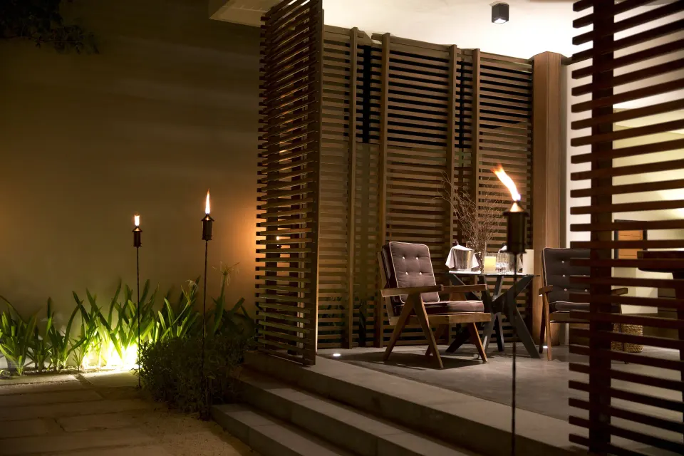 Evening terrace seating outside a Private Pool Pavilion Villa at Nizuc Resort and Spa.