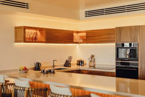 Residence kitchen with countertop appliances in Asahi 2 Bedrooms at Nobu Hotel Los Cabos.