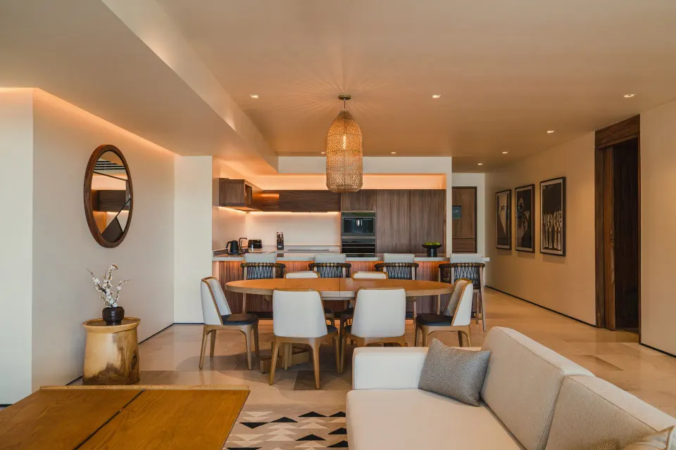 Open living and dining area in an Asahi 2 Bedrooms residence at Nobu Hotel Los Cabos.
