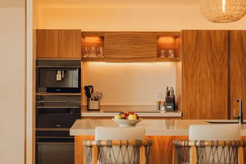 Sakyu 3 Bedrooms kitchen with island seating at Nobu Hotel Los Cabos.