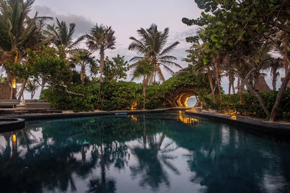 Casa Malca luxury art beach hotel with contemporary installations and beachfront pool setting in Tulum, Mexico.