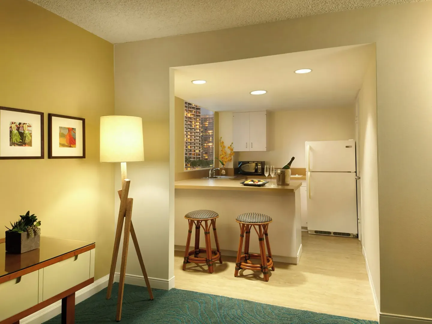 Junior suite kitchenette with breakfast bar and refrigerator at Oasis Hotel Waikiki.