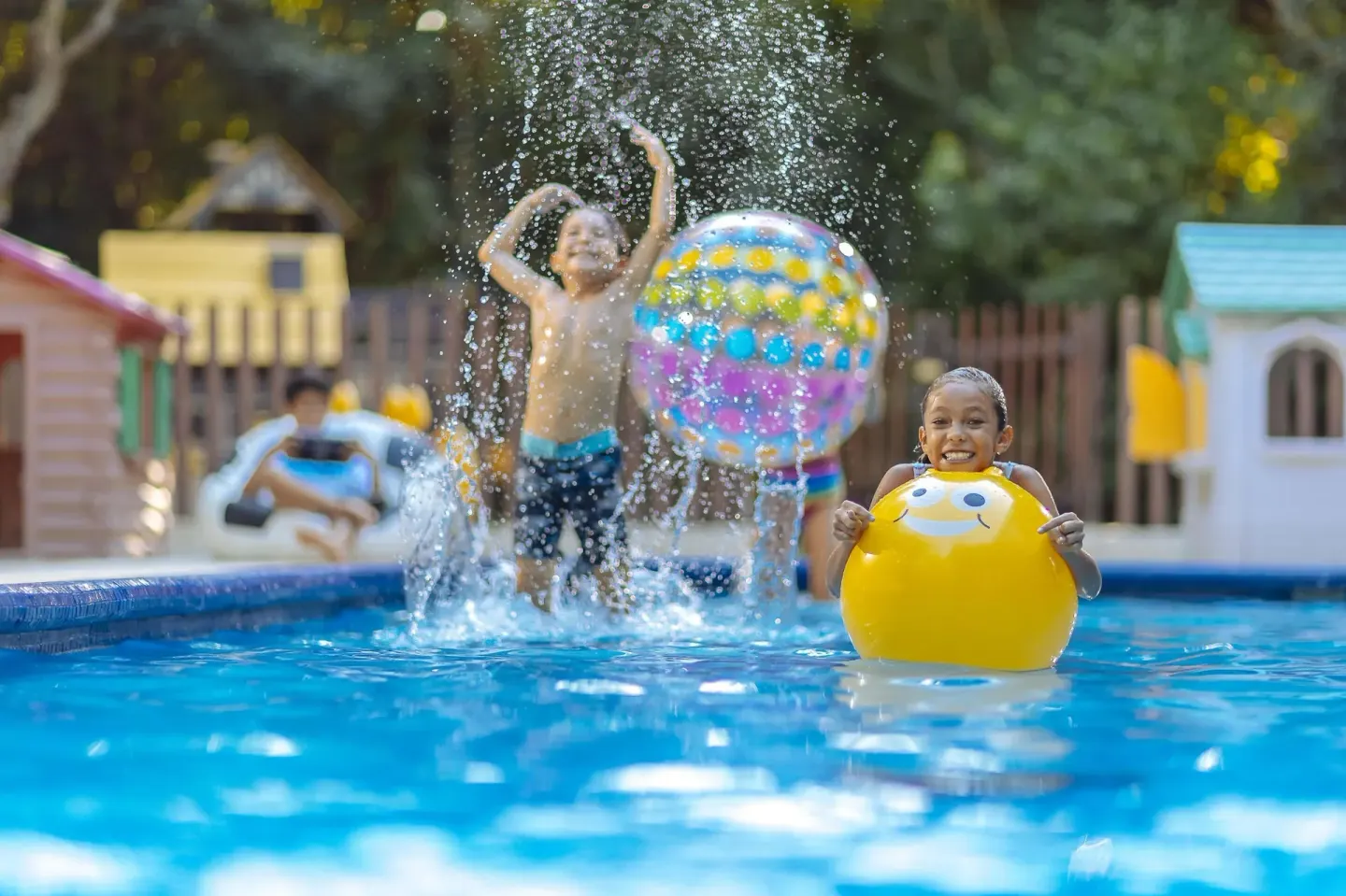 Children play with inflatable toys in the kids pool at Occidental at Xcaret Destination.