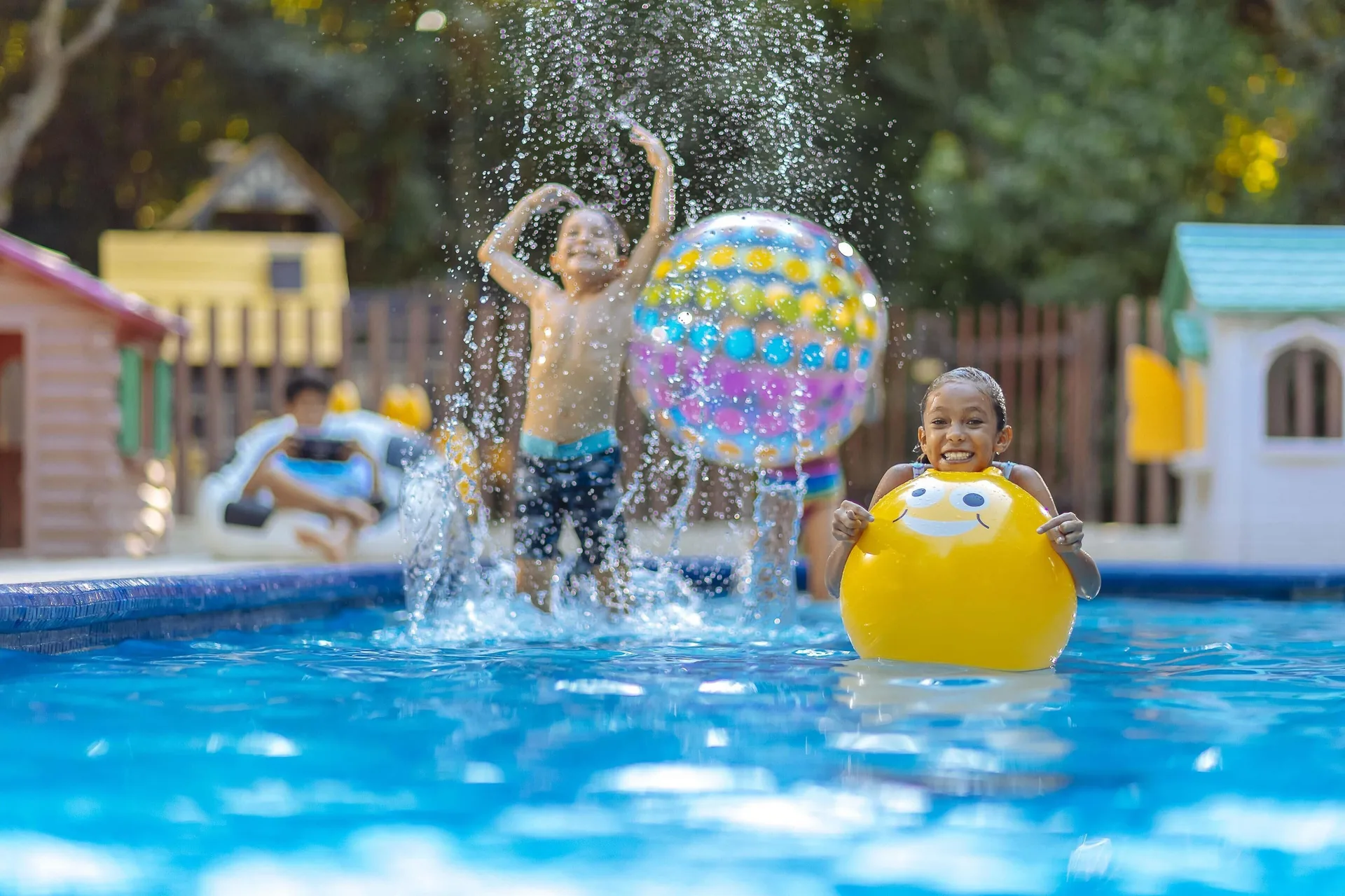 Children play with inflatable toys in the kids pool at Occidental at Xcaret Destination.