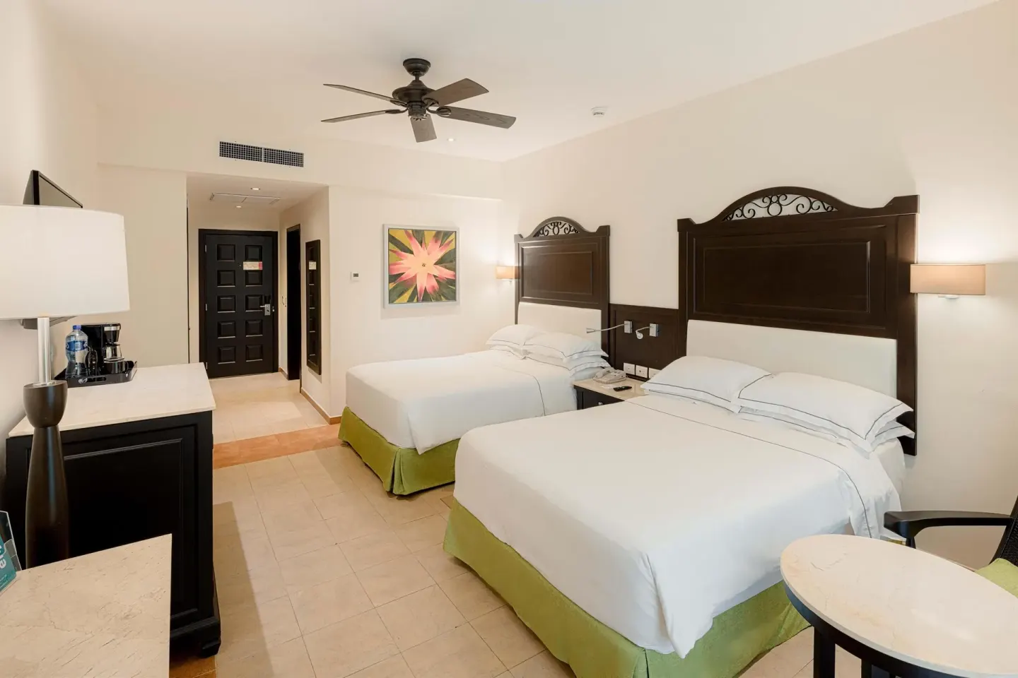 Deluxe Concierge Room with two beds and entry at Occidental at Xcaret Destination.