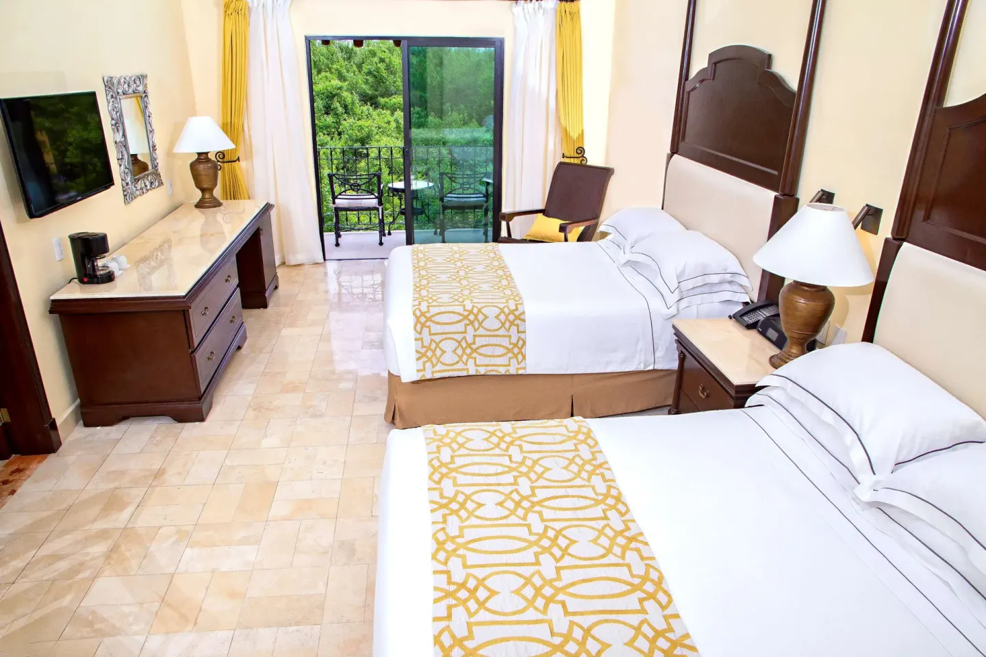Royal Level Luxury room with two beds and balcony at Occidental Cozumel.
