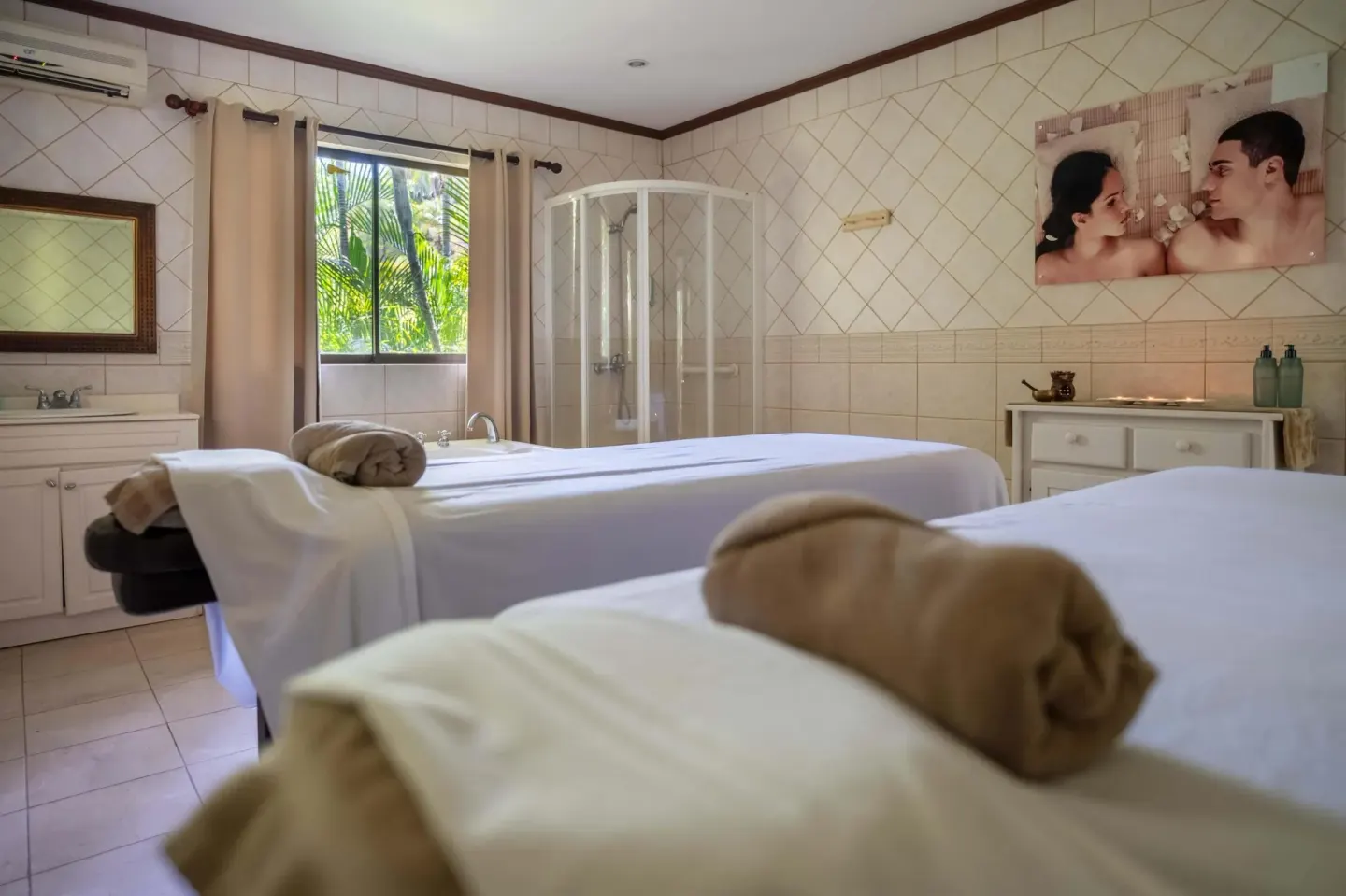 Spa treatment room with two massage tables at Occidental Papagayo.