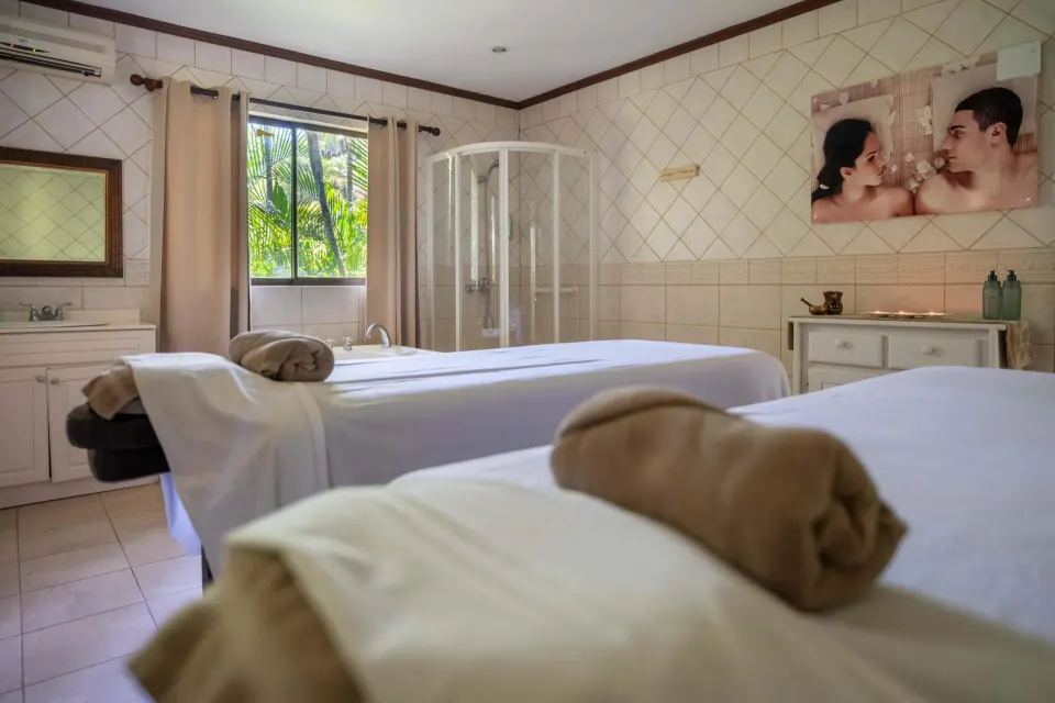Spa treatment room with two massage tables at Occidental Papagayo.