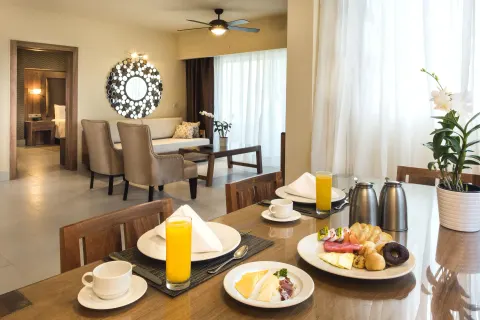 Royal Level Suite breakfast table and lounge at Occidental Punta Cana.