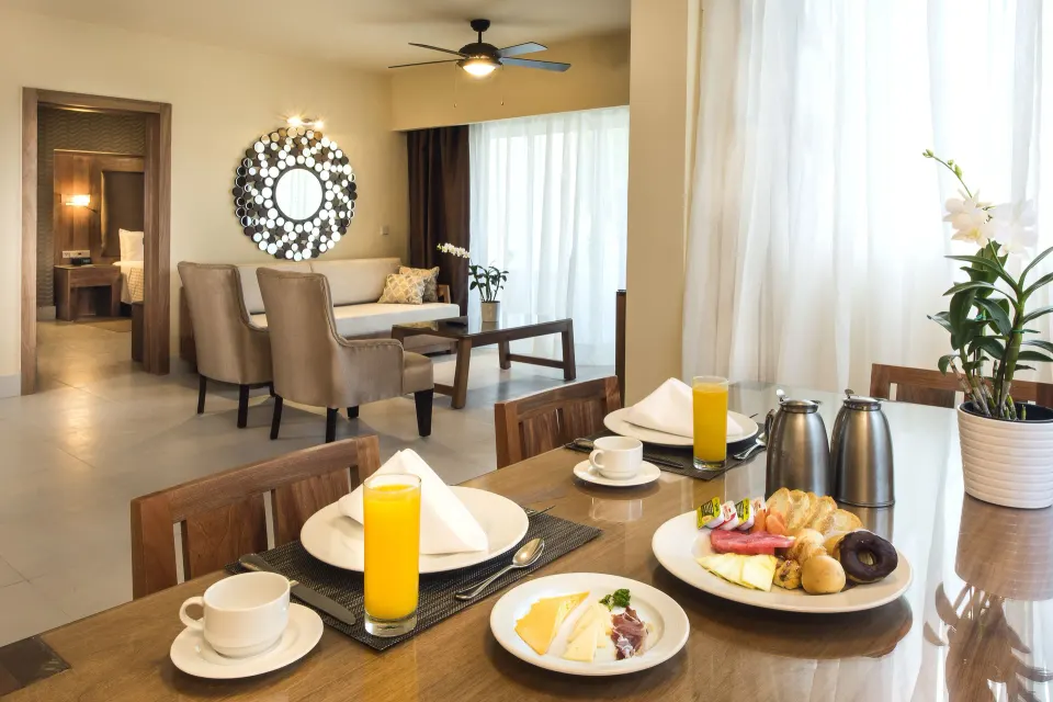 Royal Level Suite breakfast table and lounge at Occidental Punta Cana.