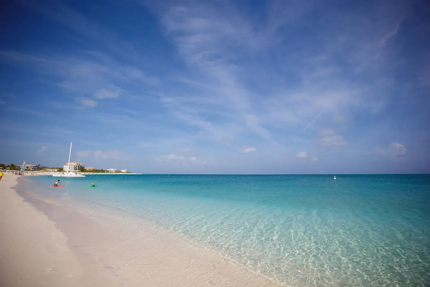 Clear turquoise water and white sand beach at Ocean Club West, Grace Bay Beach.