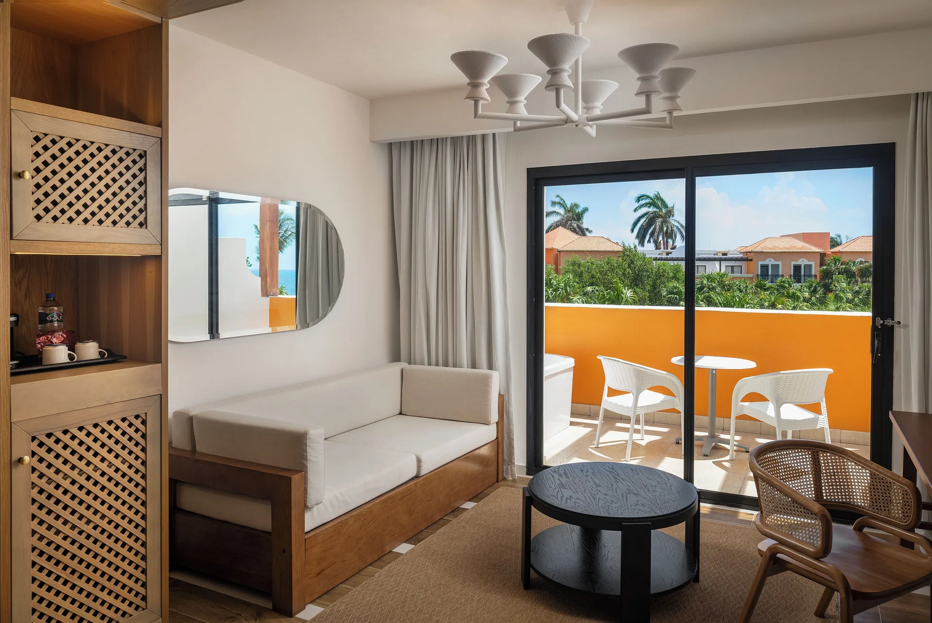 Junior Suite Elegance sitting area and balcony at Ocean Coral and Turquesa.