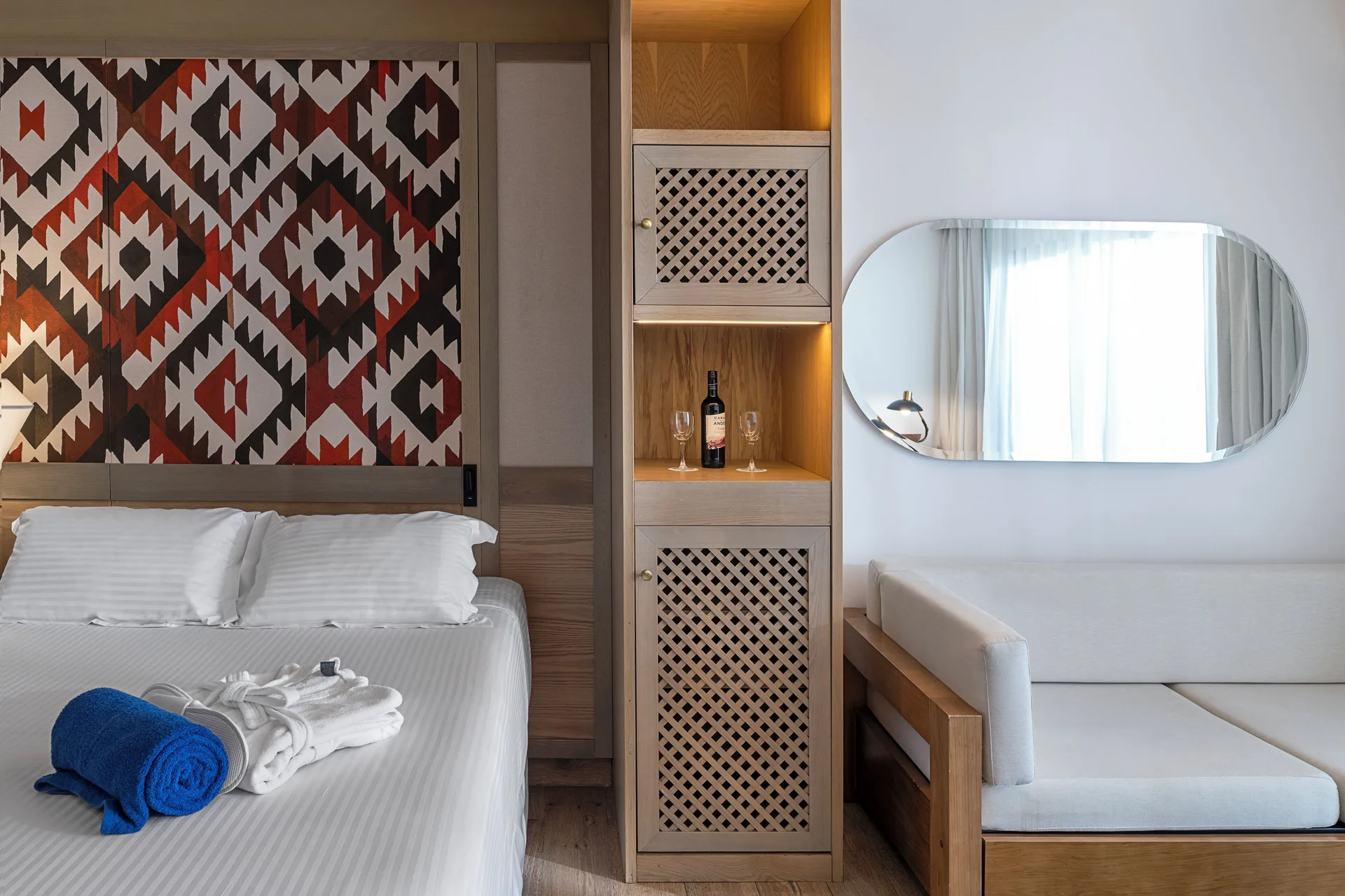 Privilege Junior Suite king bed and sitting area at Ocean Coral and Turquesa.