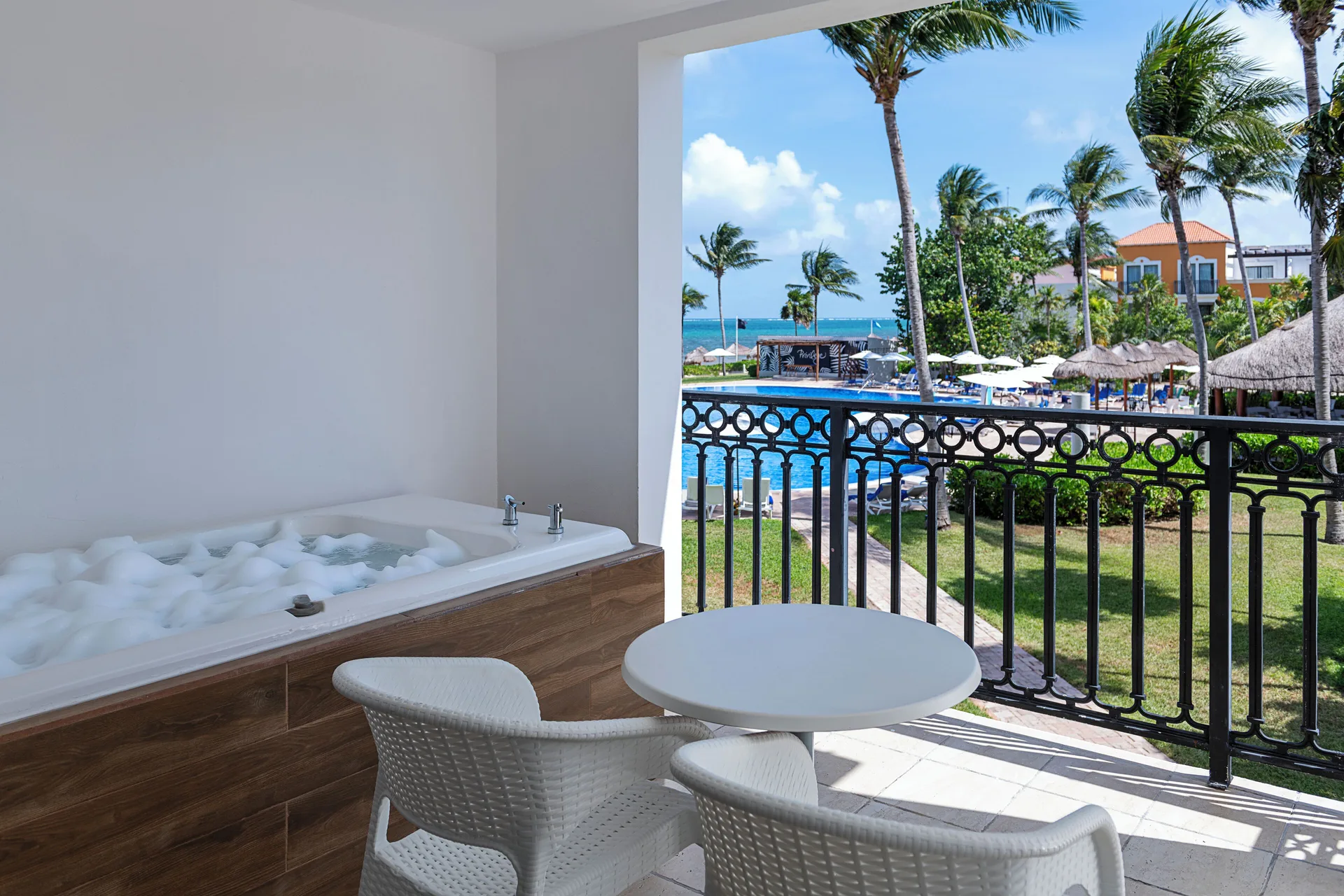 Privilege Junior Suite terrace with hot tub and pool view at Ocean Coral and Turquesa.