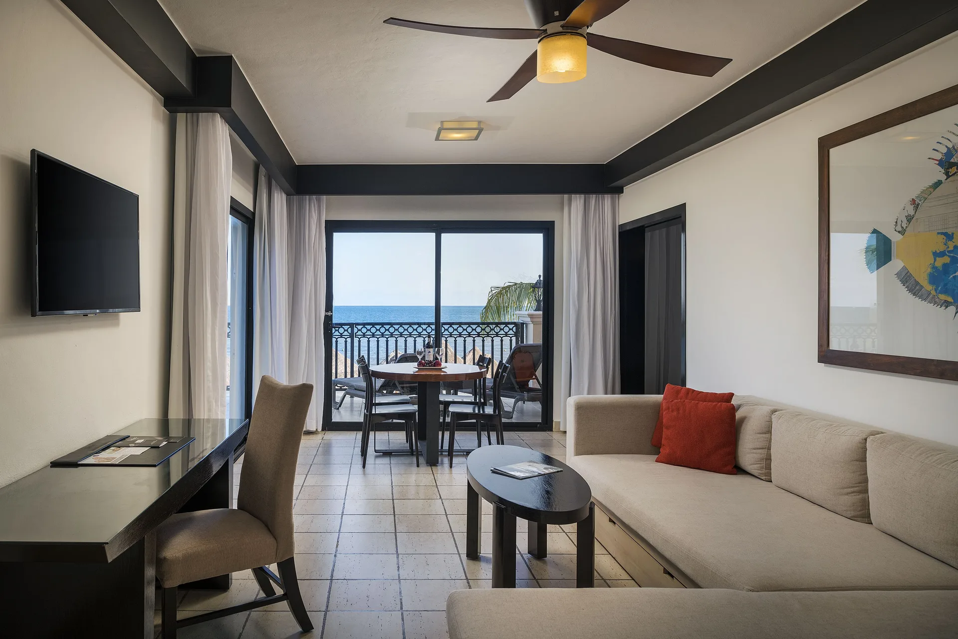 Privilege Master Suite Ocean Coral and Turquesa living area with balcony at Ocean Coral and Turquesa.