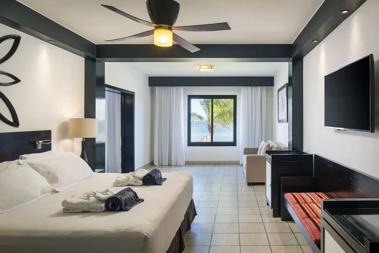 Privilege Master Suite Ocean Coral and Turquesa bedroom with king bed at Ocean Coral and Turquesa.