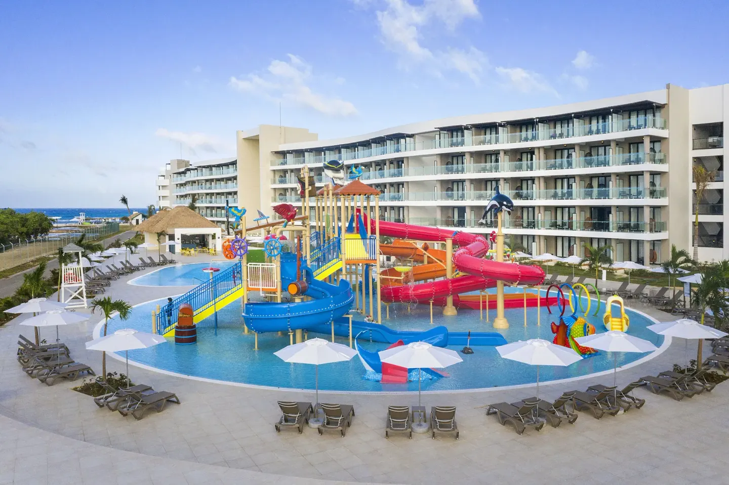 Pirate-themed splash park with slides and loungers at Ocean Coral Spring.