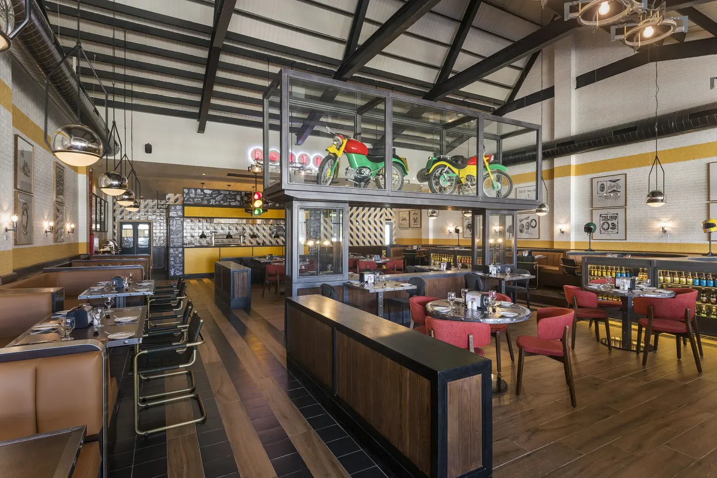 Retro themed restaurant with motorcycles above the dining room at Ocean Coral Spring.