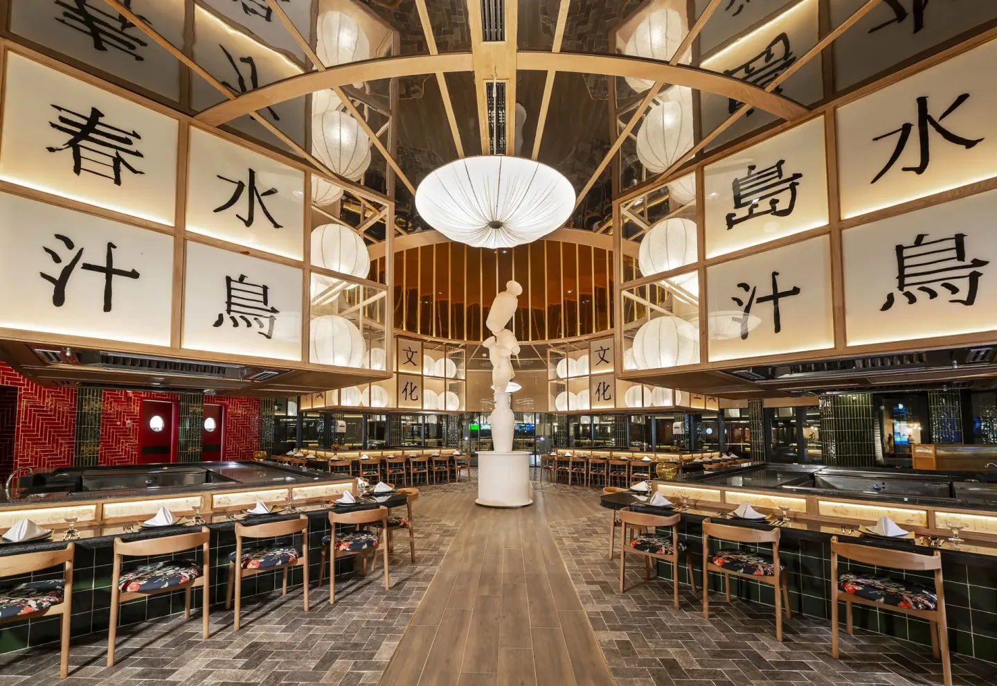 Sakura restaurant with teppanyaki counters and lantern panels at Ocean Coral Spring.