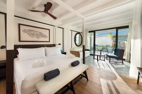 Privilege Junior Suite Swim Up bedroom with patio at Ocean Coral Spring