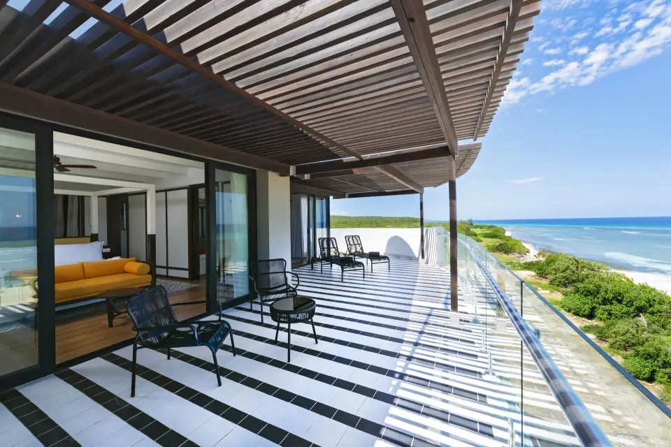 Privilege Master Suite rooftop terrace with seating and ocean view at Ocean Coral Spring.