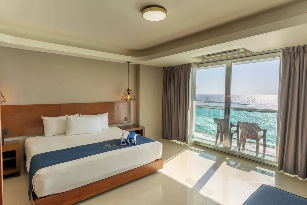 Penthouse king bedroom with balcony ocean view at Ocean Dream Cancun.