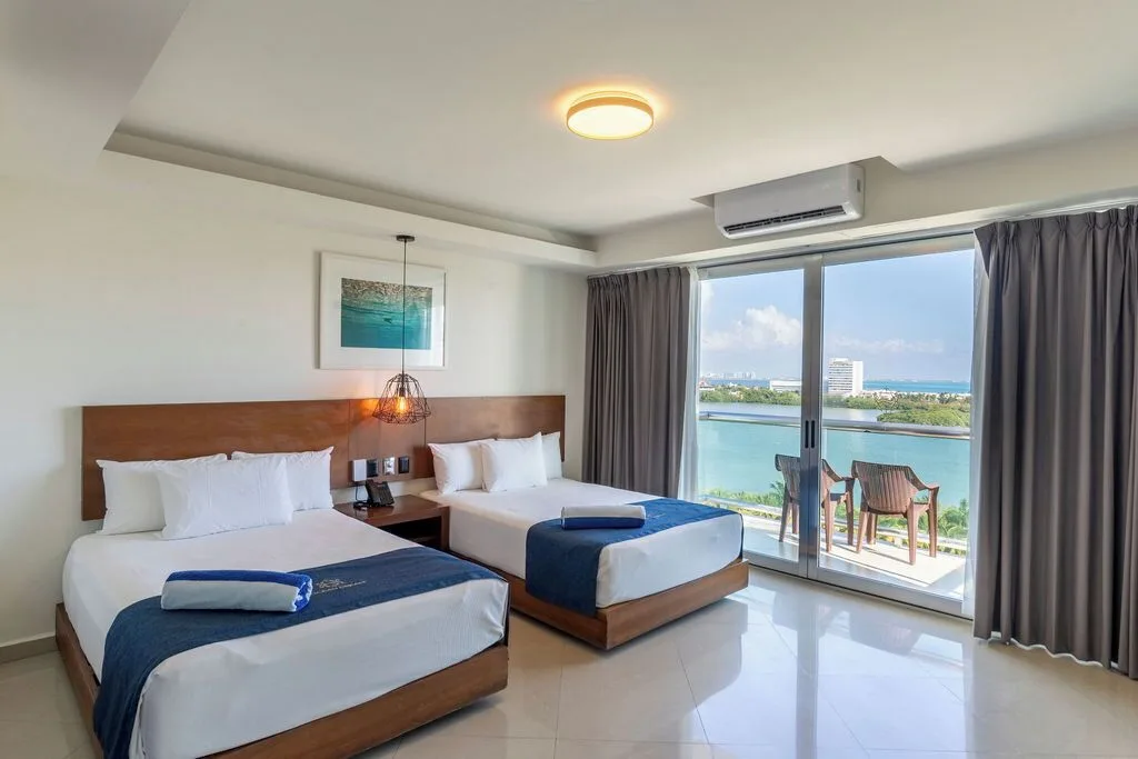 Standard Room with two double beds and lagoon-view balcony at Ocean Dream Cancun.