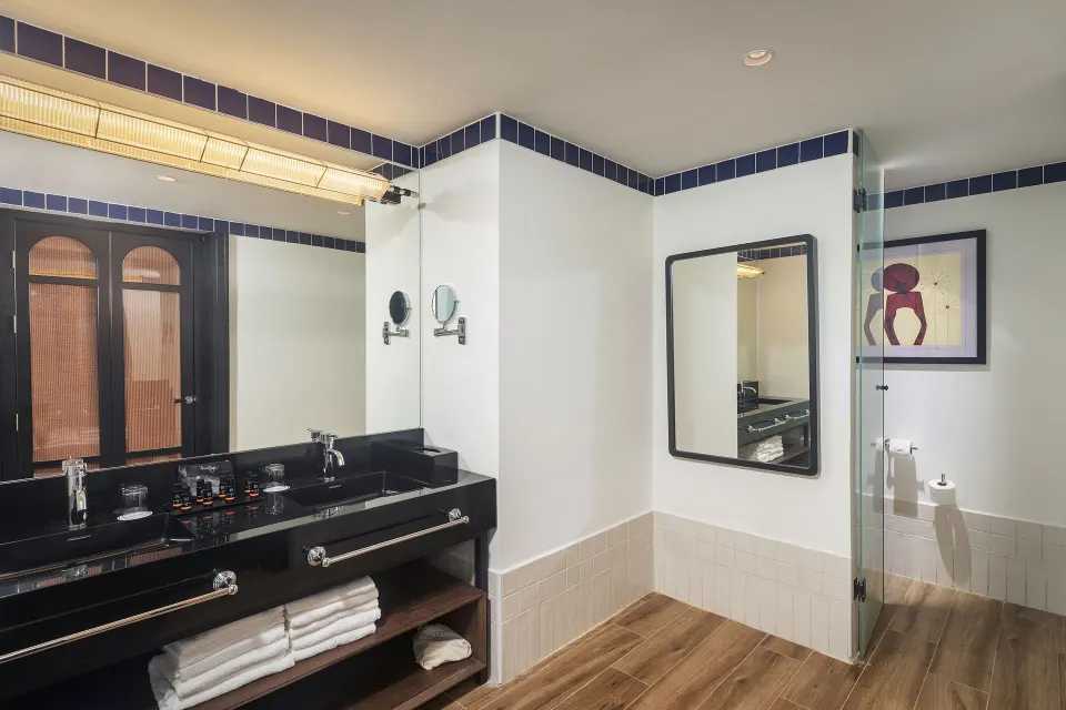 Bathroom vanity and glass shower in a Privilege Master Suite at Ocean Eden Bay.