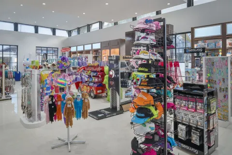 Bright resort shop with souvenirs, toys and swim gear at Ocean El Faro Resort.