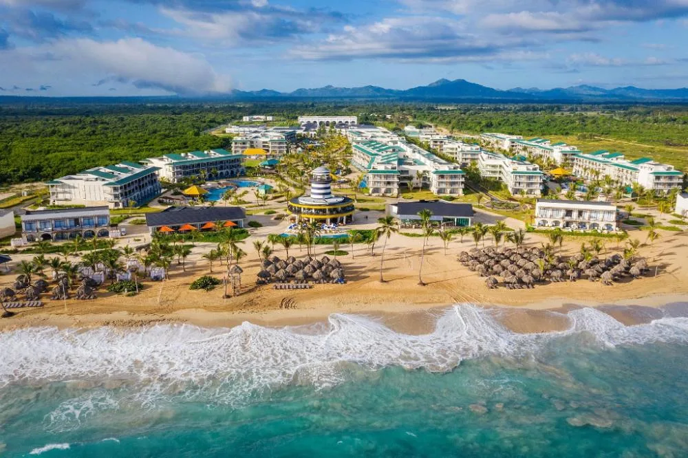 Aerial view of the beachfront grounds and buildings at Ocean El Faro Resort.