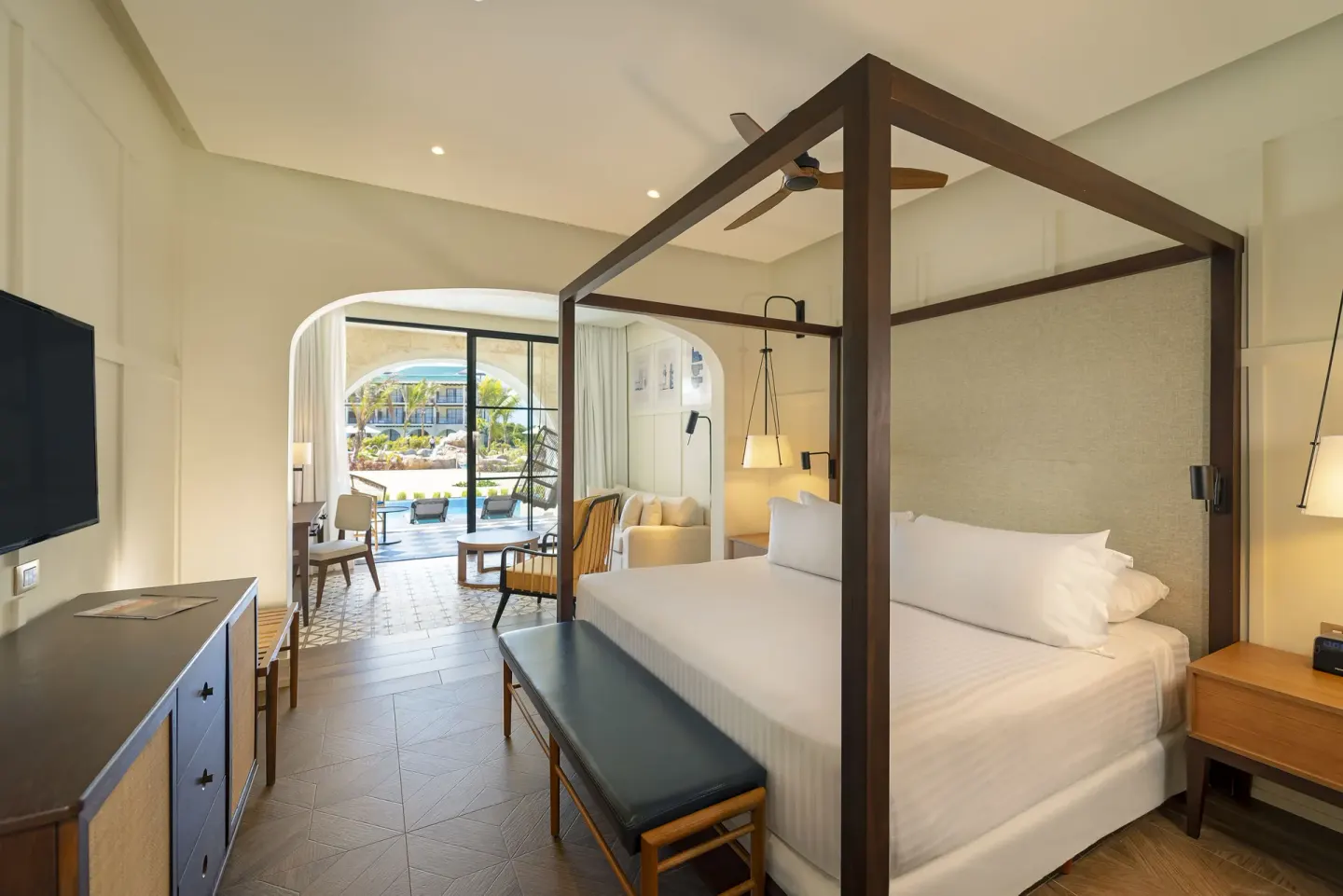 Privilege Junior Suite Swim Up with king bed and patio at Ocean El Faro Resort.