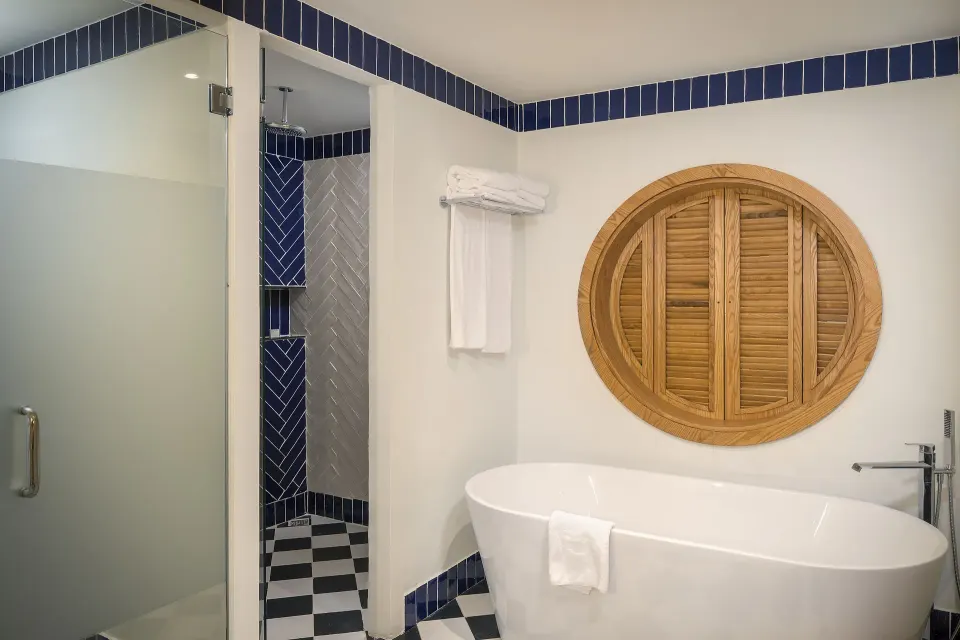 Privilege Master Suite Swim Up bathroom tub and shower at Ocean El Faro Resort.
