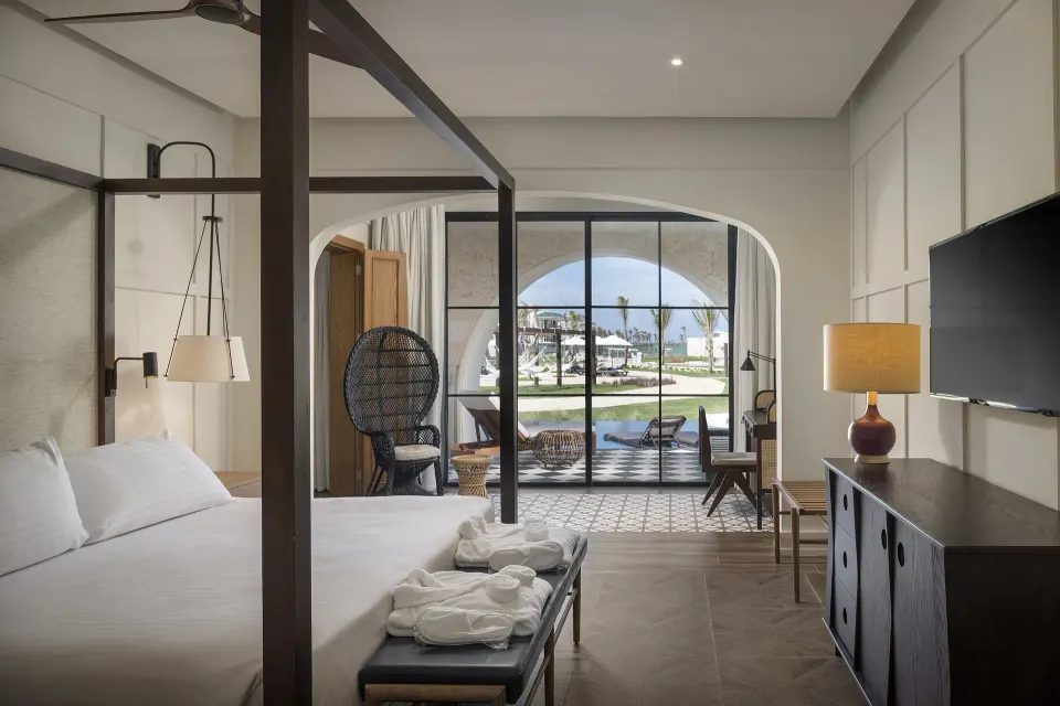 Privilege Master Suite Swim Up bedroom and terrace at Ocean El Faro Resort.