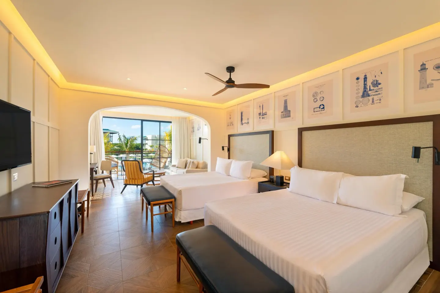 Junior pool view room with two beds and balcony at Ocean El Faro Resort.