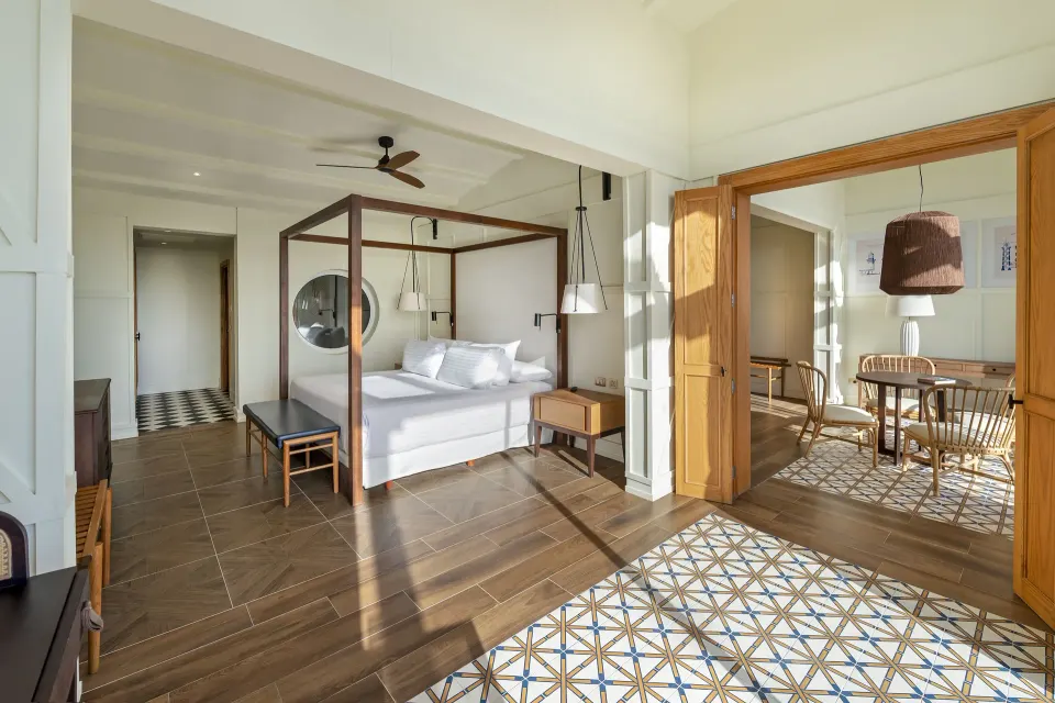 Royal Master Suite bedroom and dining area at Ocean El Faro Resort.